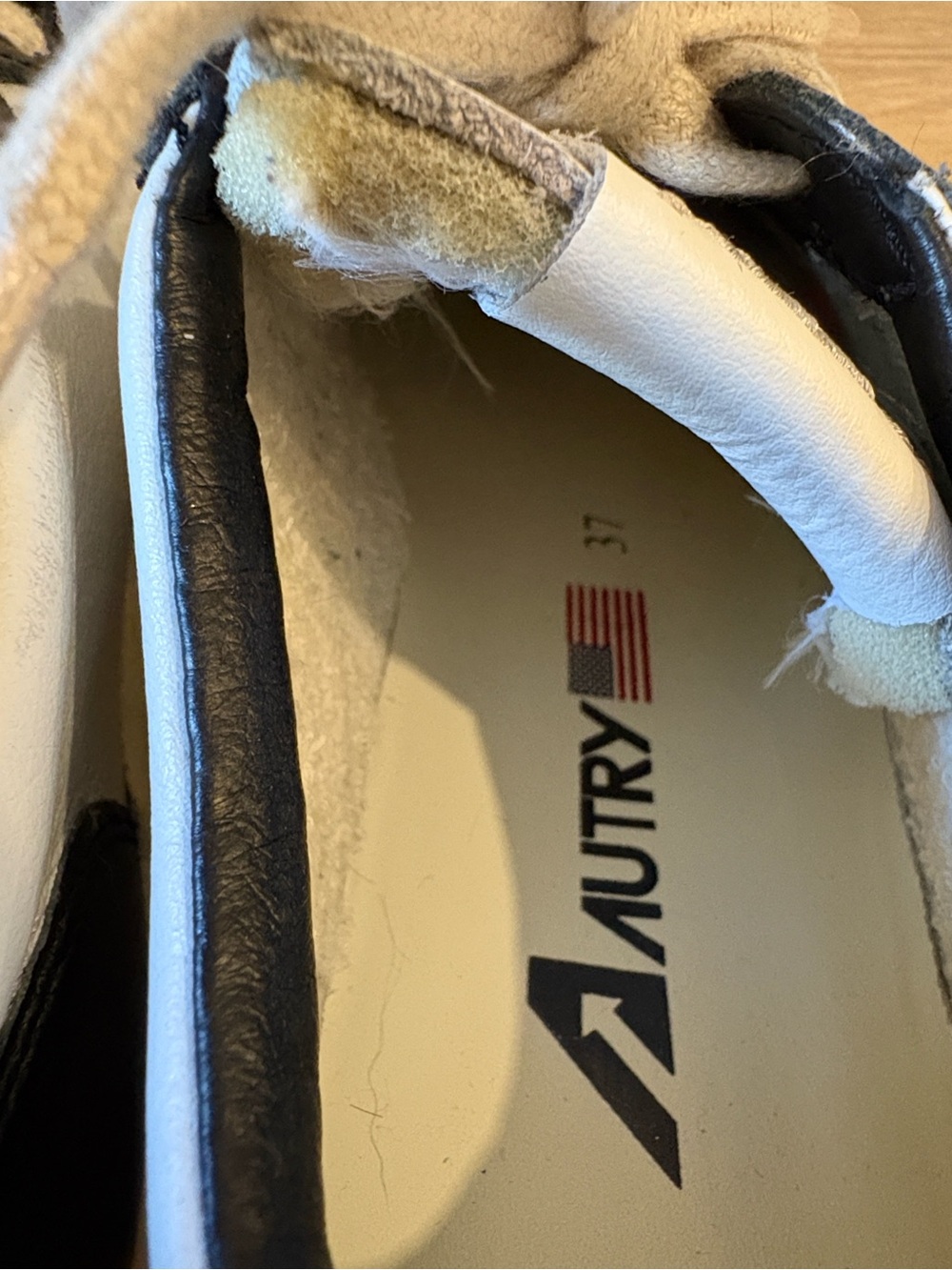 Autry Women's Leather Low-Top Sneakers in White and Navy